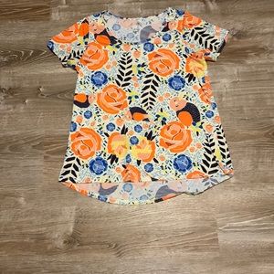 Women’s Lularoe size large rose and bird tee